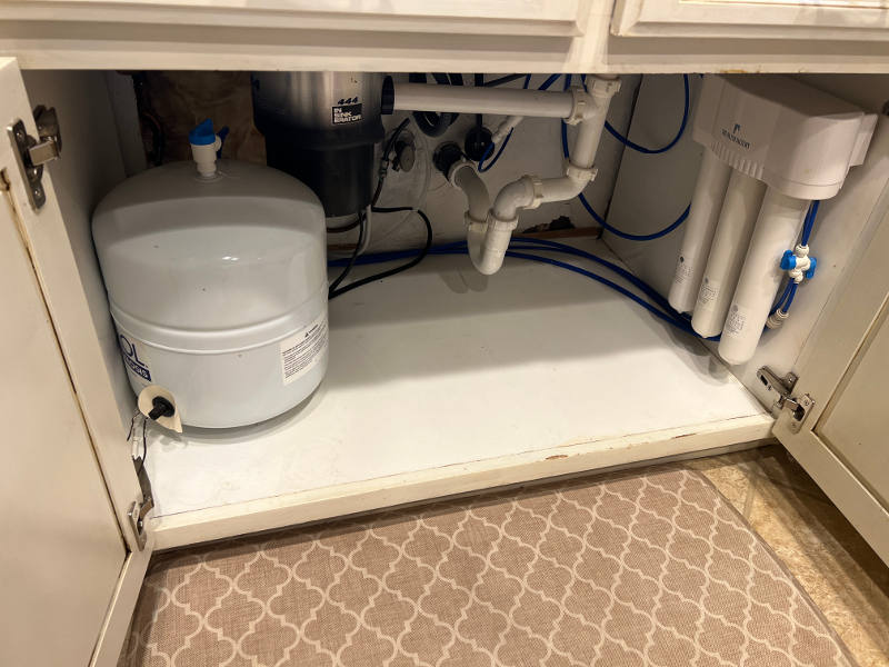 RO water filter installed under kitchen sink